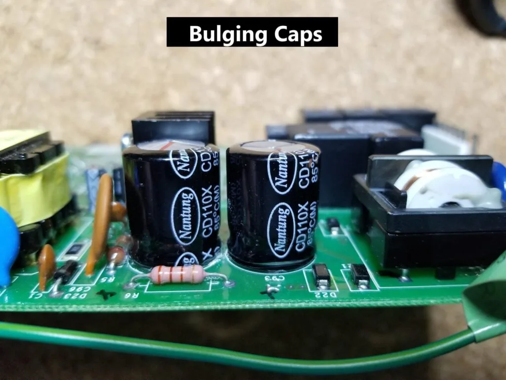 bulging capacitor on circuit board