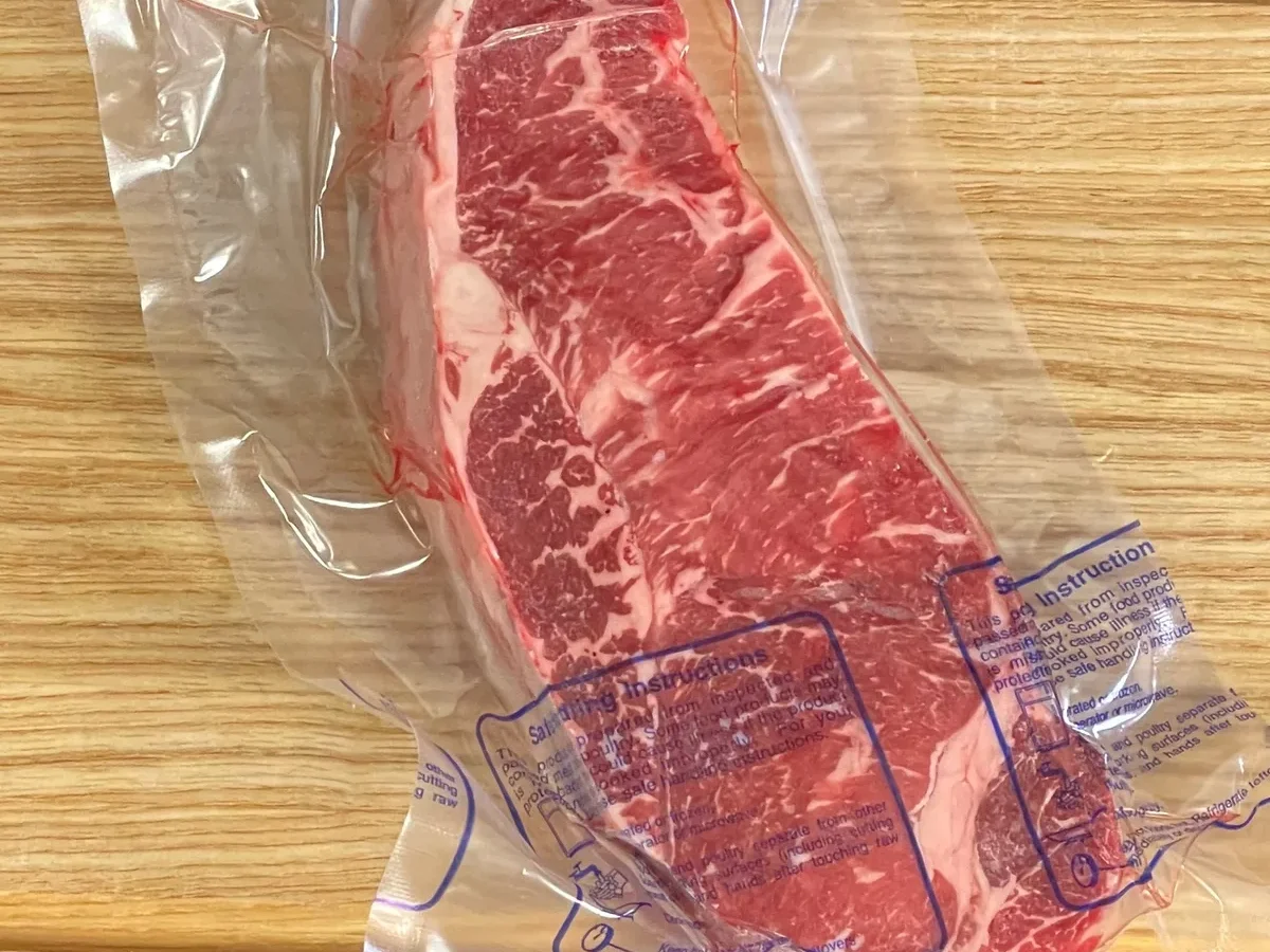 bulk frozen ny strip steaks vacuum sealed