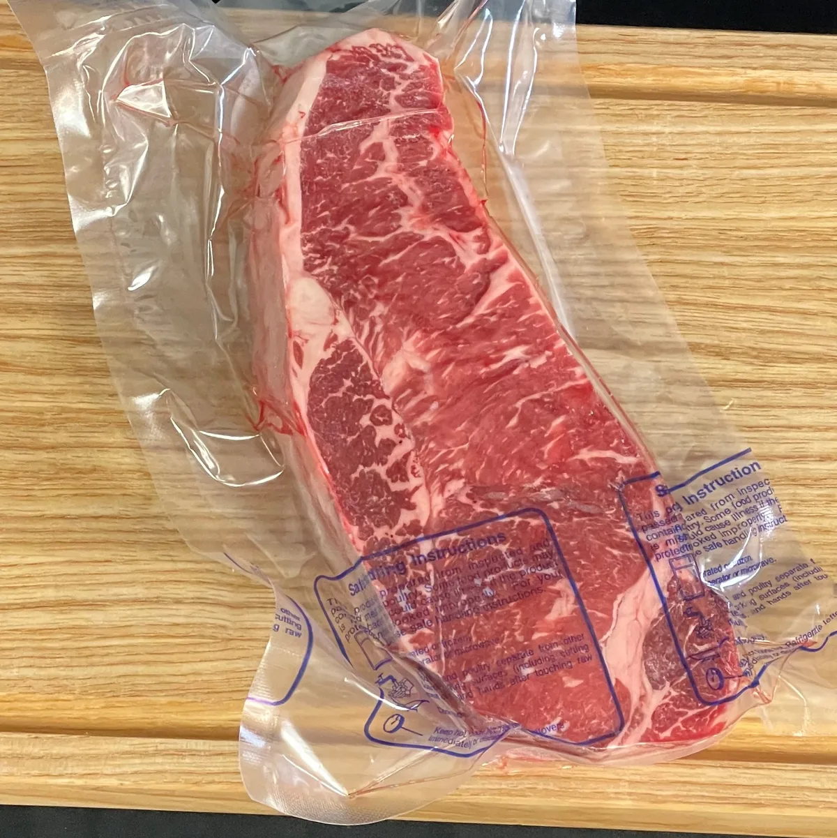 bulk frozen ny strip steaks vacuum sealed