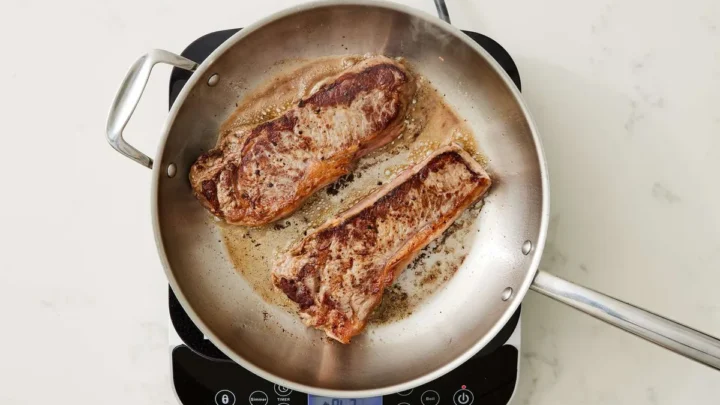 can you put adding meat to cold pan before proper leidenfrost water bead test in a tri-ply stainless steel cookware set safely