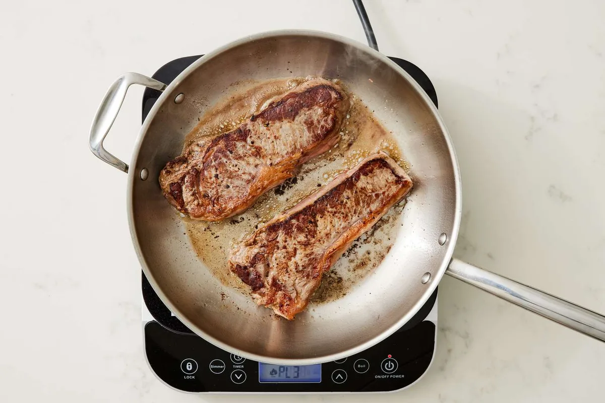 can you put adding meat to cold pan before proper leidenfrost water bead test in a tri-ply stainless steel cookware set safely