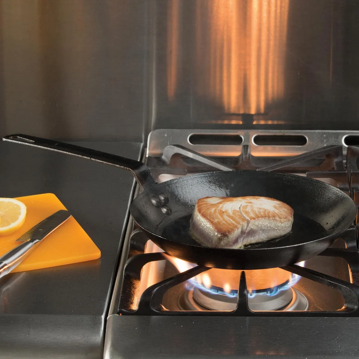 can you put cooking vinegar or tomato sauces in newly seasoned carbon steel in a carbon steel skillet safely