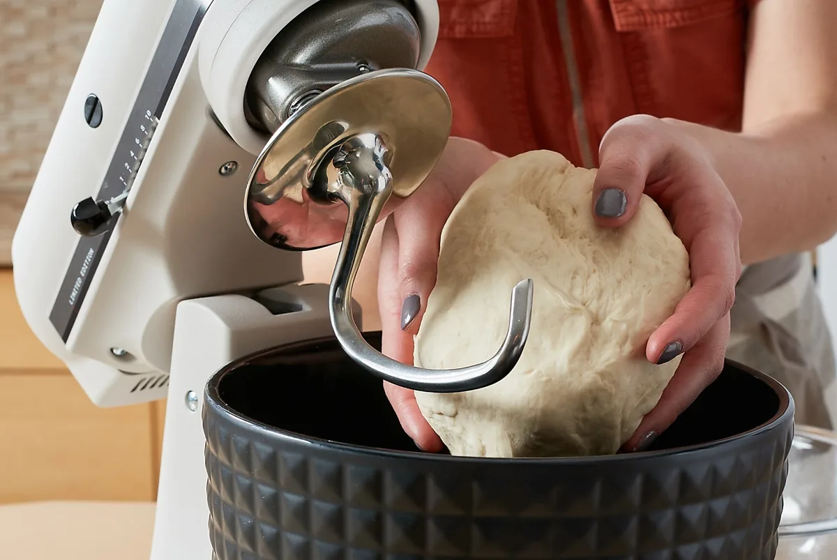 can you put kneading heavy bagel dough causing plastic gears to strip in a budget stand mixer under 100 safely