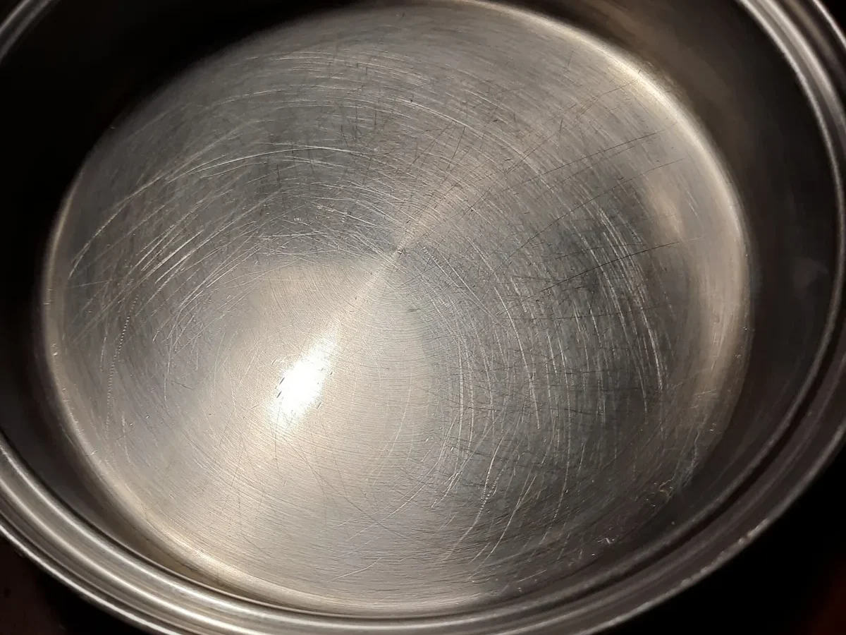 can you put shocking hot pan in ice cold water bath in a 5-ply stainless steel skillet safely