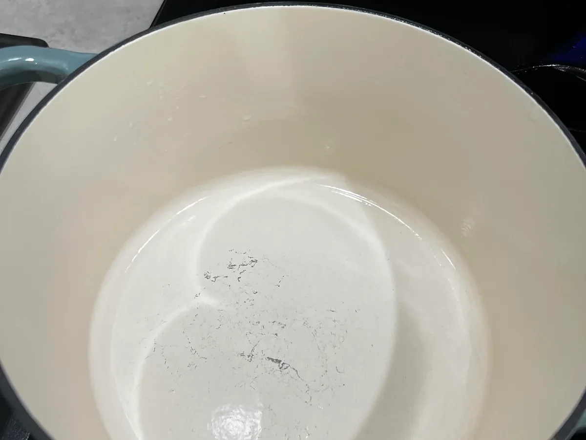 can you put using metal immersion blender directly in enameled braiser in a enameled cast iron braiser safely