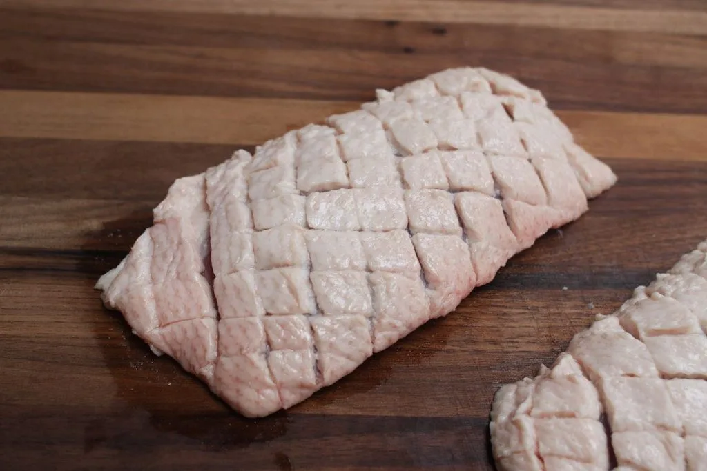 duck breast crosshatch scoring close-up