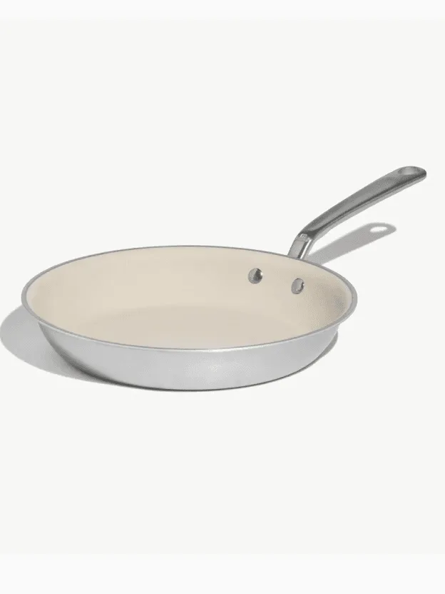 how to clean budget ceramic frying pan and remove greasy yellow film on white ceramic nonstick surface