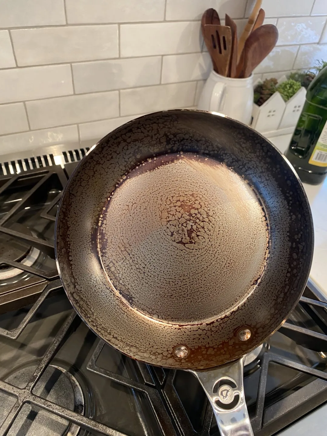 how to clean carbon steel skillet and remove sticky gummy amber oil layer from over-oiling seasoning