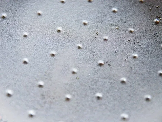 how to clean enameled cast iron braiser and remove gray metal utensil scrape marks on enamel surface