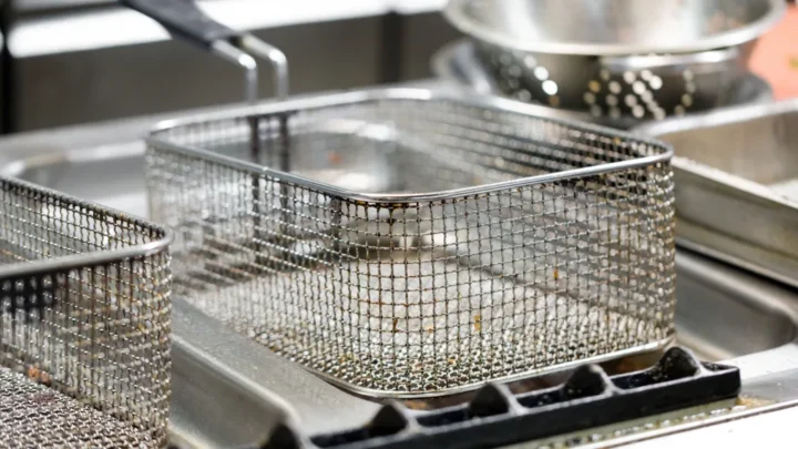 how to clean triple basket family size deep fryer and remove burnt batter flakes accumulated around heating element coils