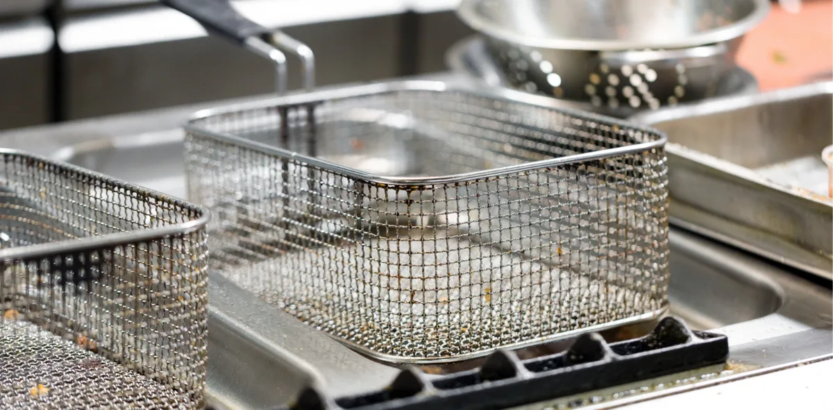 how to clean triple basket family size deep fryer and remove burnt batter flakes accumulated around heating element coils