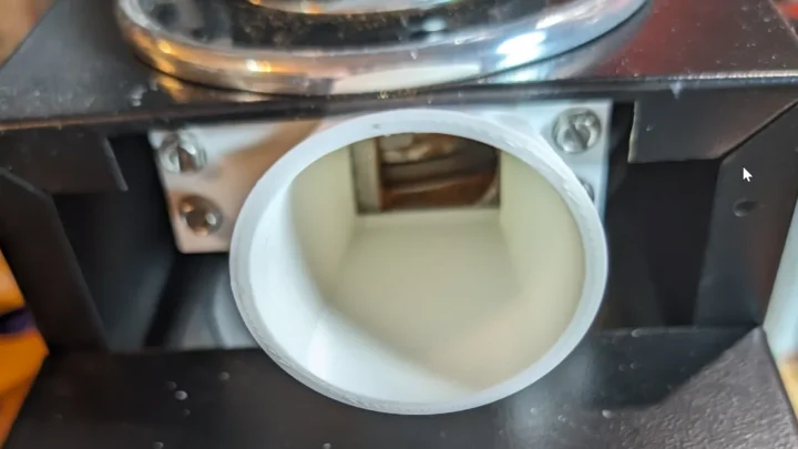 how to fix grind and brew automatic coffee maker grinder chute clogging with oily steam condensation