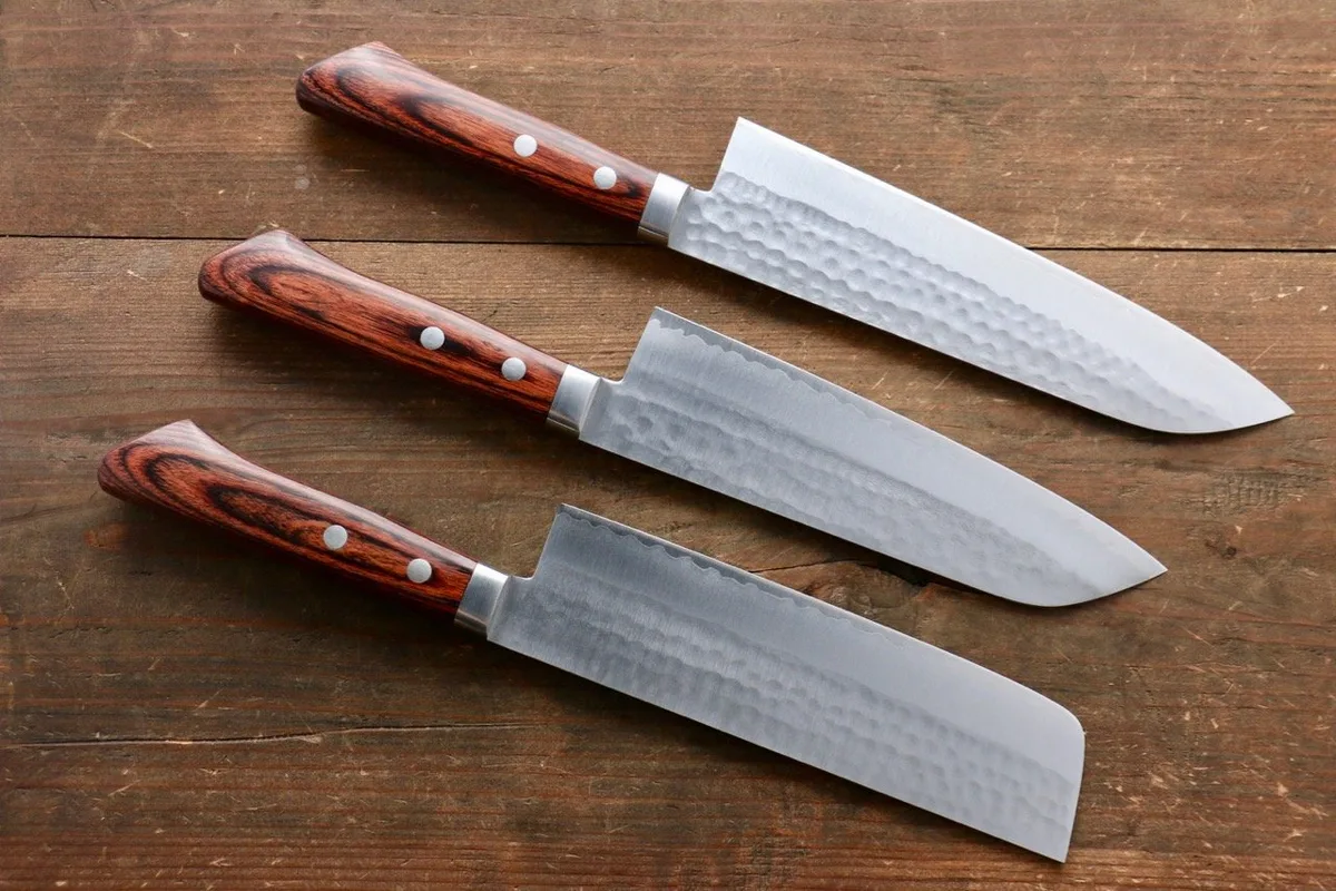 Japanese high-carbon chef knife blade edge chipped after twisting
