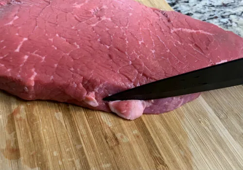 trimming fat before grinding